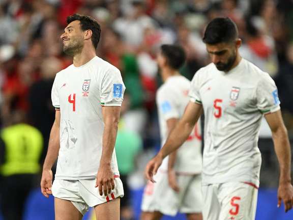 Iran's Shoja Khalilzadeh looks dejected after his last minute goal against Egypt gets disallowed after a VAR review, June 26, 2026