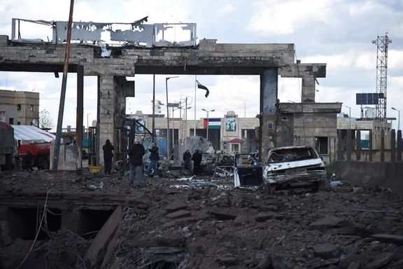 People inspect the damage at the Lebanese-Syrian border crossing of Arida after it was damaged following an Israeli strike that occurred late on Tuesday, Lebanon November 27, 2024.