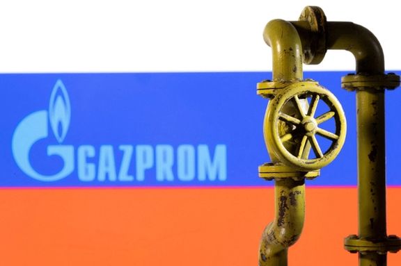 A 3D printed natural gas pipeline is placed in front of displayed Gazprom logo and Russian flag in this illustration taken February 8, 2022.