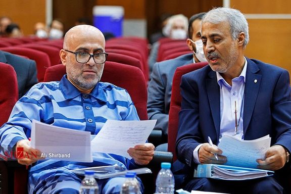 Former judiciary deputy Akbar Tabari (left)