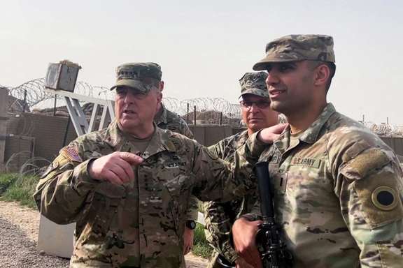 US Joint Chiefs Chair Army General Mark Milley speaks with US forces in Syria during a visit at a US military base in Northeast Syria, March 4, 2023