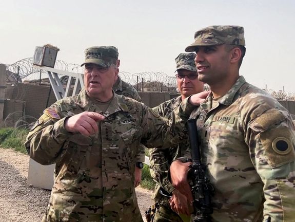 US Joint Chiefs Chair Army General Mark Milley speaks with US forces in Syria during a visit at a US military base in Northeast Syria, March 4, 2023
