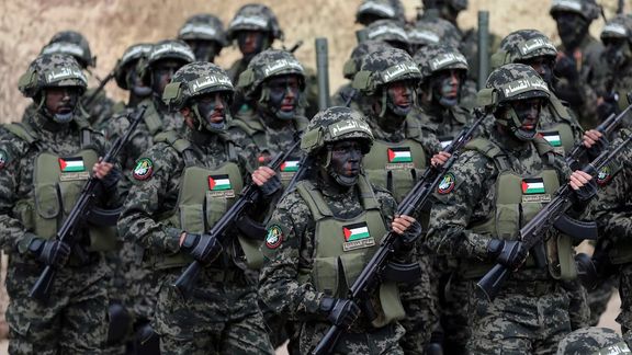 Palestinian Hamas militants take part in a rally marking the 31st anniversary of Hamas' founding, in Gaza City December 16, 2018.