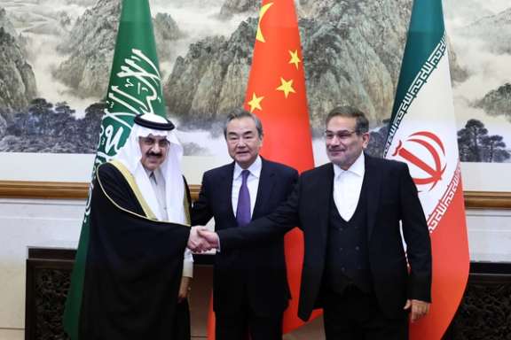 Wang Yi, China’s chief diplomat, Ali Shamkhani (R), Iran’s national security chief, and Saudi representative Musaad bin Mohammed Al Aiban in Beijing, March 10, 2023
