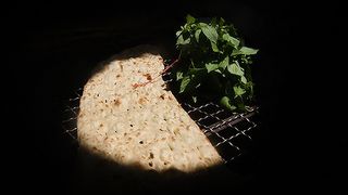 Iran's runaway inflation empties tables, pushes children out of school