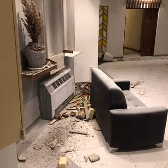 Security forces ransacked the lobby of one apartment building in November 2022