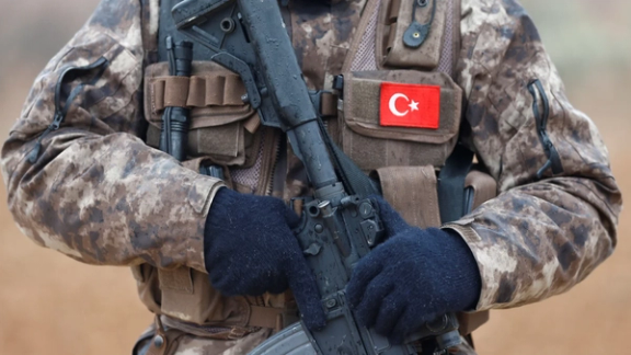 A member of the Turkish special forces stands guard in Azaz, Syria, on 24 January 24 2018