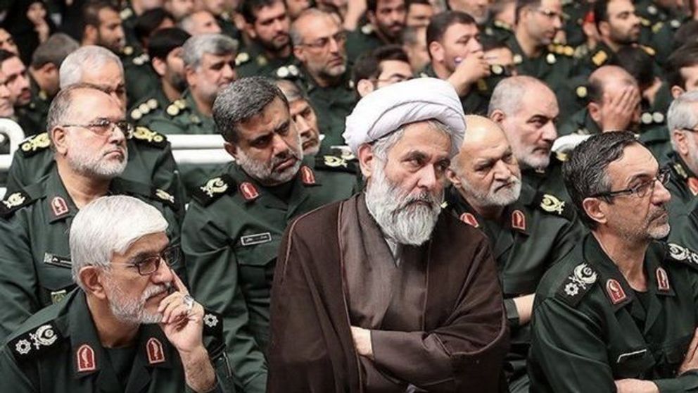 Former IRGC intelligence Chief Hossein Taeb (center)