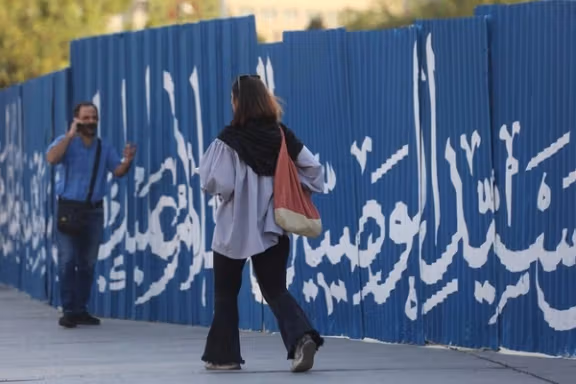 An Iranian woman without mandatory hijab in Tehran