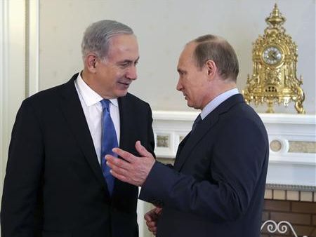 Russian President Vladimir Putin (right) meets with Israeli Prime Minister-Designate Benjamin Netanyahu
