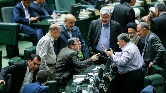 Lawmakers in heated discussion in the Iranian parliament