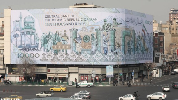 File photo of a mural at Tehran’s Enqelab square showing the Iranian 10,000-rial banknote worth less than two cents now