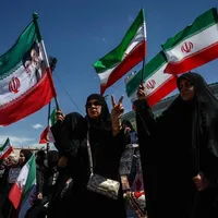 Iran officials celebrate ceasefire as critics warn it could stall change