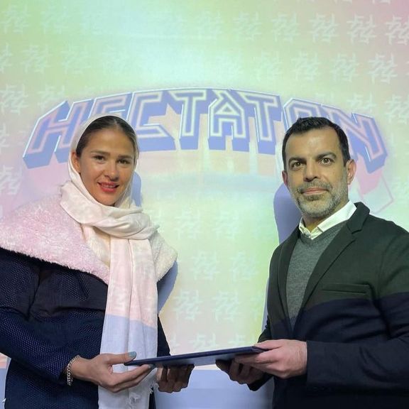 Mahsa Javar (L) and Hectaton brand owner Ali Ajdarkosh (R), who provided the athletes' outfits